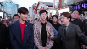 Korean singer Changmin (middle) in a Vivienne Westwood Coat and Knitwear