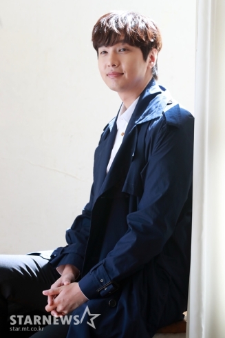 Korean actor Ji Hyunwoo in a Vivienne Westwood Trench Coat and Shirt