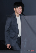 Korean actor Kim Muyeol in a Vivienne Westwood Suit & Knitwear